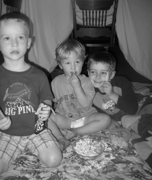 Jesse, Owen and Joshua already in "the zone", watching the movie.  :)
