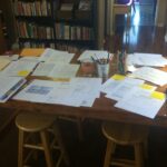 school table with dossier documents